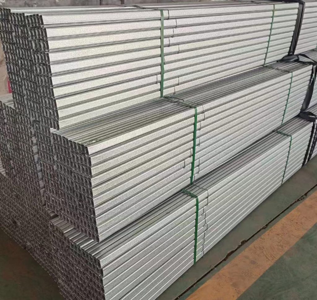 Version 1.0.0 Stack of galvanized besi hollow ready for distribution, offering high strength and durability, available at toko besi terdekat with competitive pricing.